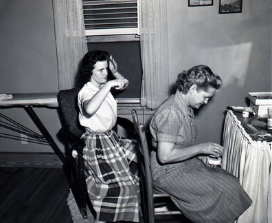 541-Kathryn and mom, test shot with new camera. April 28, 1959