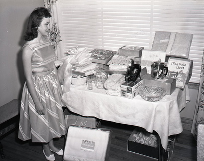 566-Patsy Edmonds with shower gifts. May 10, 1959