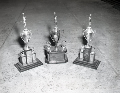 702-MHS Annual shots Home Ec class trophies. November 10 1959