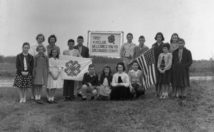 156-Troy 4-H erects welcome sign at county line March 1957
