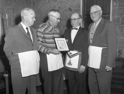 302- Dan A. Bell receives 40-year Mason certificate. March 3, 1958