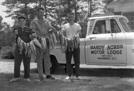 1796- Clyde  Barry  & Emory with fish May 15 1966