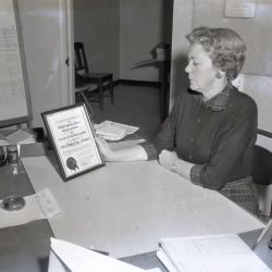 M139 Mrs  Klugh Connor receivs certificate from Navy for recruitment service 7 November 1958