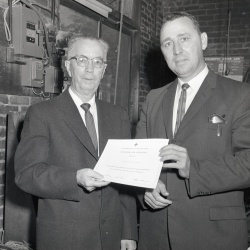 M566 Dr. Lockwood receives Red Cross Certificate December 1962