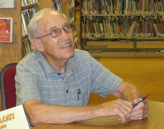 Bobby F. Edmonds, signing his books at the McCormick County Library. A longtime library board member, Bobby worked to ensure the establishment of a new library in 2004.